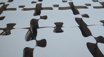 Blanc puzzle pieces made from plywood or HDF